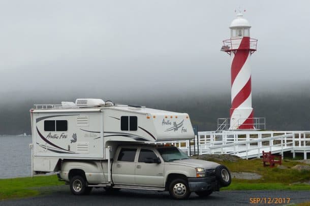 #164 - Tim ZehHearts Content, Newfoundland, Canada2005 Chevy Silverado 35002007 Arctic Fox 1150Camera Used - Panasonic DCM FZ200Linda, Snickers and I were traveling through Newfoundland and decided to stop in Hearts Desire to see the Cable Museum.  This is the location of the first Trans-Atlantic telegraph cable that connected North America and Europe.  The cable was laid across the Atlantic in 1860s and Hearts Desire became a telegraph station for the North American side of the cable.We got to the museum about 4:50 and it was about to close, so we decided we'd stay in the area overnight.  We were driving out of town and we looked over and there in the distance was the lighthouse.  We followed a road and found it.We parked for the night and it was really windy.  I pulled the slide in that night to keep the topper from blowing away. The next morning was still with a misty rain and fog.  The museum opened at 9:30am.  I thought I'd snap a picture for the calendar.  I turned the truck around to get a picture of its good side, but that's another story.  Needless to say, check your lug nuts!