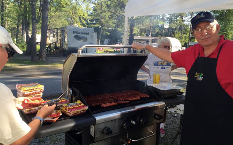 Mikeee making hot dogs for the group