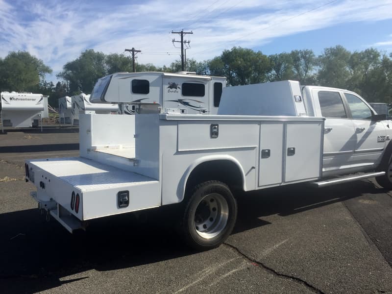 Utility bed for a truck camper