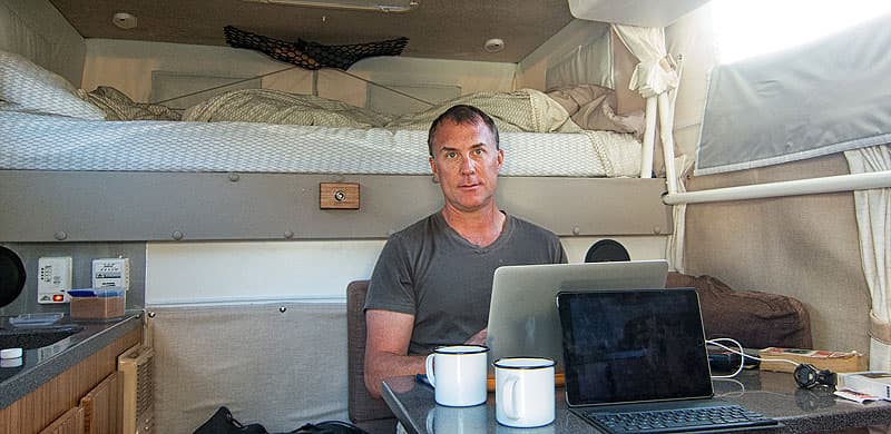 John inside Hallmark Pop-Up Camper