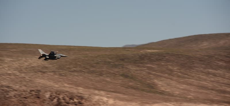 Jet fighter overhead in Death Valley