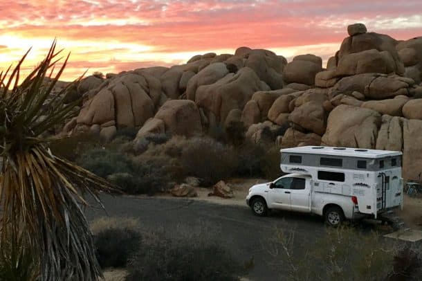 #089 - Mary StrasserJoshua Tree Tree National Park, California2009 Toyota Tundra2015 Hallmark UteCamera Used - iPhoneReturning from the San Francisco Bay Area to Colorado after Thanksgiving, we drove through Joshua Tree, hoping to stay overnight.  It took us a good hour of searching since the campsites were full.  We finally located this site as the sun was setting and the clouds were glowing.  I climbed on rocks across the road to take a picture of our camper during its maiden voyage.