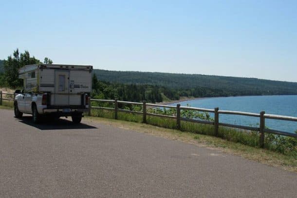 #114 - Ron and Kristen ZerbstKeweenaw Peninsula, Upper Michigan2002 Chevrolet Silverado1989 Valor DakotaCamera Used - Go ProThis picture was taken after a great overnight camp in Copper Harbor, Michigan.  We were heading back south on M26 and we were talking about all the spots we thought would be great for an overnight boondock.  There are miles of country roads with beautiful beaches. This picture is our pick for our favorite spot with an amazing overlook outside the small town of Eagle Harbor, Michigan.  Just beautiful!