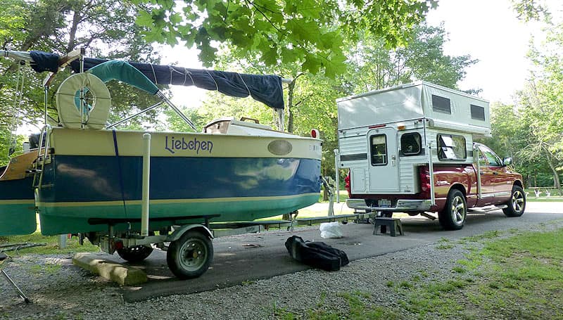 Sailboat parked in campsite while camping