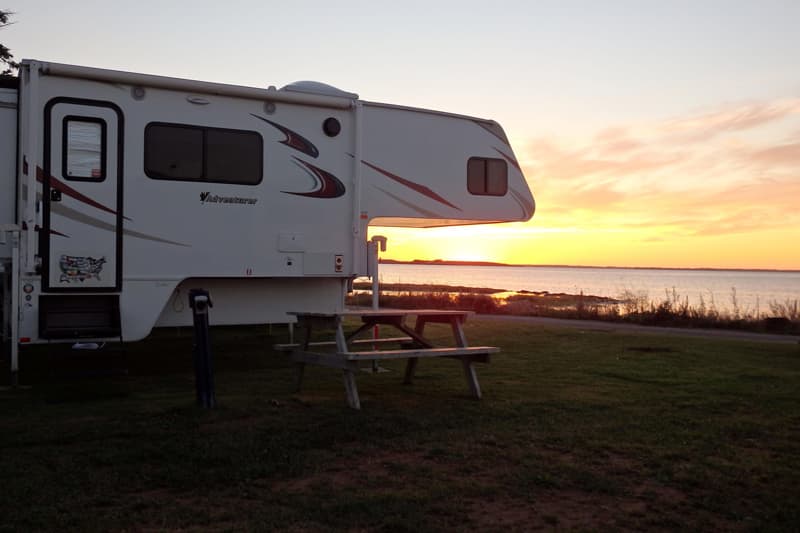 Camper off truck, Malpaque Bay, Prince Edward Island