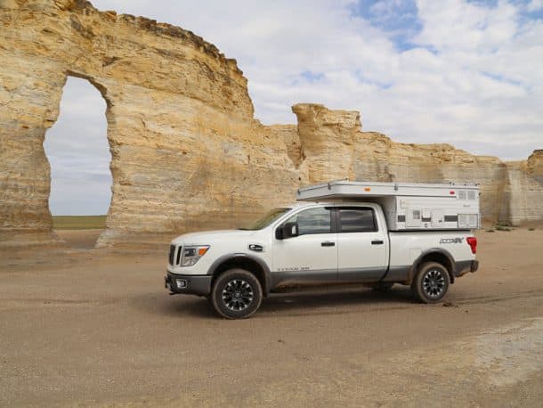 #300 - Wayne PageMonument Rocks, Kansas2016 Nissan Titan XD2007 Four Wheel Camper HawkCamera Used - Canon 6dI had stopped my Monument Rocks several years ago when heading out to see the last Indian battle site in Kansas near Scott City with my F150.  This June my son and I stopped by again on the way out to Denver to meet some friends flying in from Germany.  It had just rained earlier in the day and the dirt roads were slick.  On the way there, with a high crown and deep ditches in some spots, I feared sliding off and getting stuck, delaying our plans to pick up friends at the airport.  My new Nissan truck kept us on track, even though it was sideways at times.  We got to our destination and then back to paved roads on time to continue our journey.