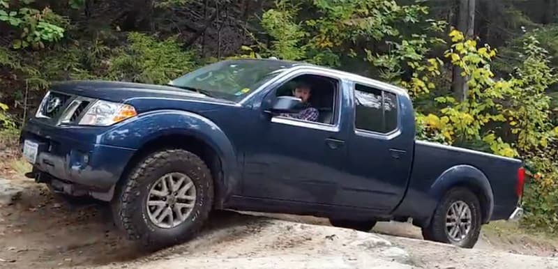 Nissan with no running boards because of ground clearance