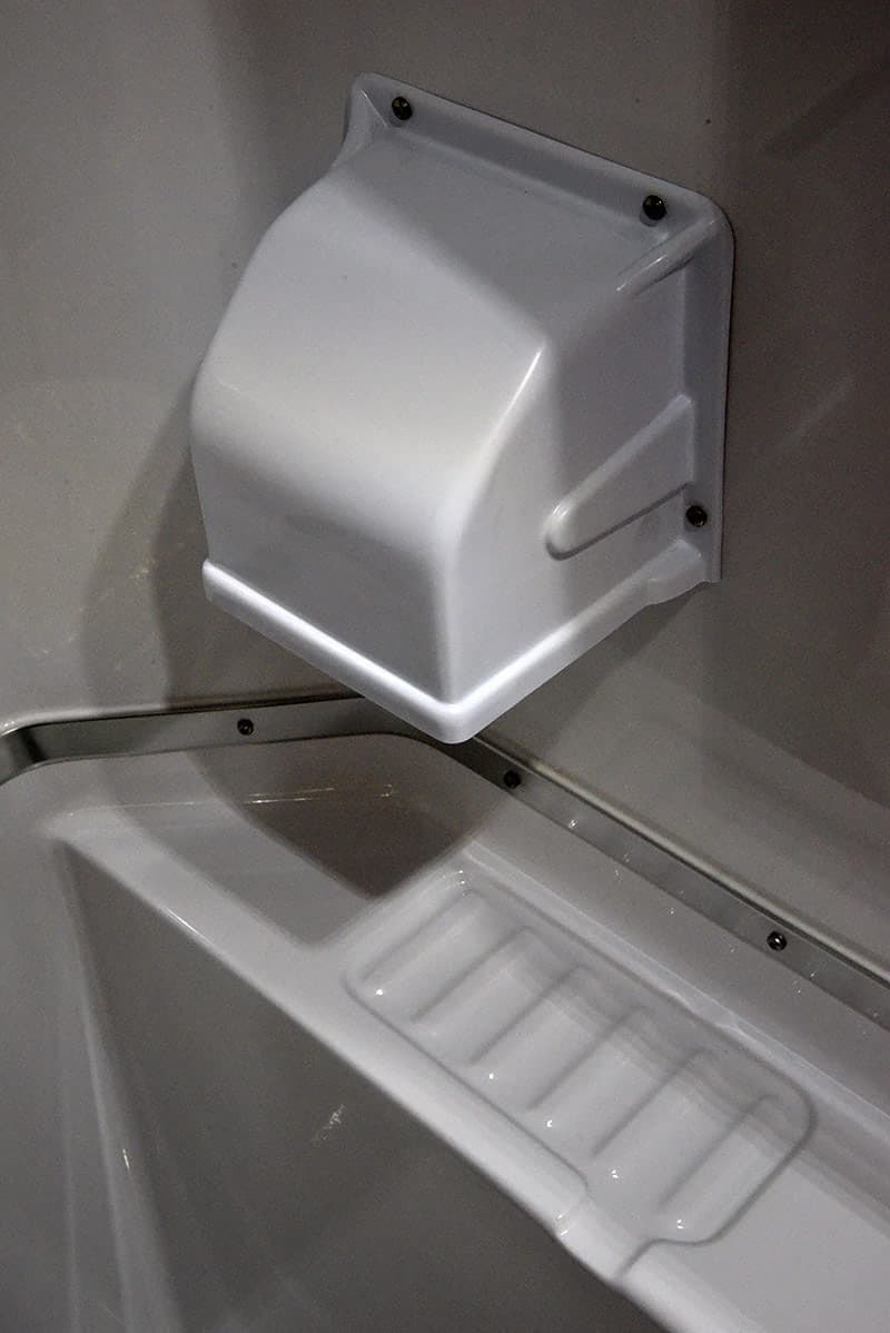 Toilet paper holder in wet bath camper