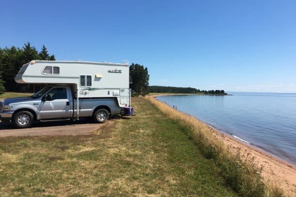 #139 - Doug JenkinsNorthumberland Provincial Park, Prince Edward Island, Canada2003 Ford F2502003 Palomino 8801Camera Used - iPhone 6sMy wife, Robin, and I had been camping in eastern part of Prince Edward Island.  Since this is our home province, we decided to tour more campgrounds in the area before heading home.  We stopped in at Northumberland Provincial Park, near the Wood Islands’ ferry terminal, and were pleasantly surprised at the nice campground/day park and its close access to the beach.  We saw a truck camper moment and took a photo for your 2018 Truck Camper Magazine calendar.