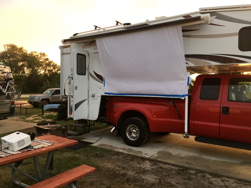 Outdoor movie screen on camper