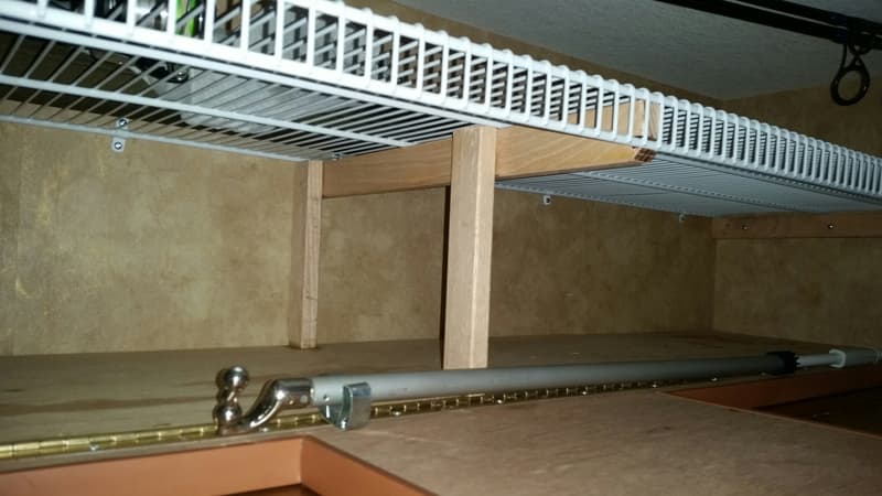 Supports in dinette bunk for storage