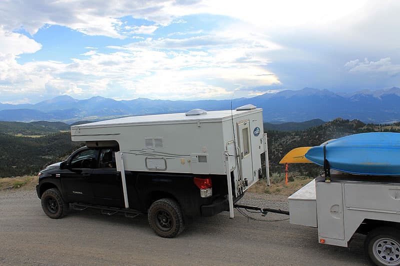 Phoenix Camper towing small trailer with kayaks