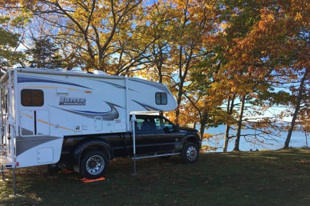 #073 - Bruce TinklerRecompence Shore Campground at Wolfe’s Neck Farm, Freeport, Maine2013 Ford F3502013 Lance 1181Camera Used - iPhone 6sThis is the first place I actually met and got to know truck campers.  Recompence Shore Campground in Freeport, Maine was one of the places the North-East Truck Camping Jamboree had their gatherings.We were welcomed there as outsiders, and not yet truck camper owners.  We were invited into campers which were lived in; not shiny new on a show room floor.  We got to know people who have become our friends.  We were invited to share a meal with the group.Since then, they have moved on from this place, but my wife and I continue to go back. It is wonderful because you can go at any time of year leaving payment at the office in an envelope when you arrive.  We go in November because that is when the Jamboree met there.  Maine is wonderful for camping in November.  The crowds are gone, and it is peaceful.  This photo is from our trip last fall.