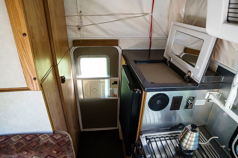 Short bed bathroom in popup camper