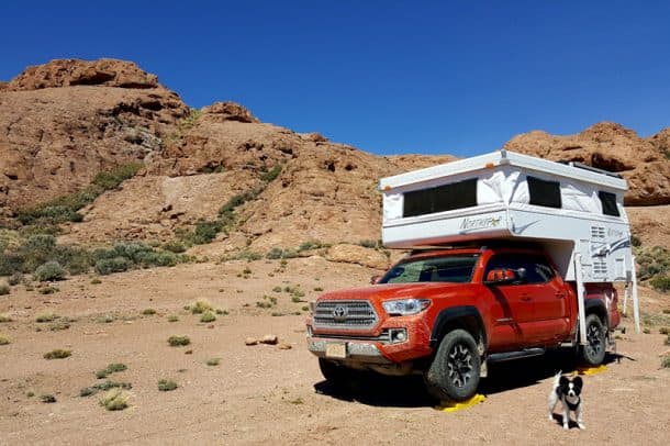 #025 - Juanita ReeseToiyabe National Forest near Tonopah, Nevada2016 Toyota Tacoma  2017 Northstar 600SS Camera Used - Samsung Edge smartphone On our Northstar's maiden-voyage trip to the southwest, we found this unexpected gem of a campsite after traveling off-road.  Thanks to our solar panel system, we boondocked and enjoyed campfires, scrambles up rocky ridges, historic ruins, and starry skies in absolute privacy.  Our traveling companion, Lil' Guy, insisted on being in this photo.
