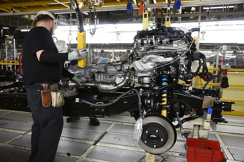 Guiding the Toyota engine and transmission into the truck chassis