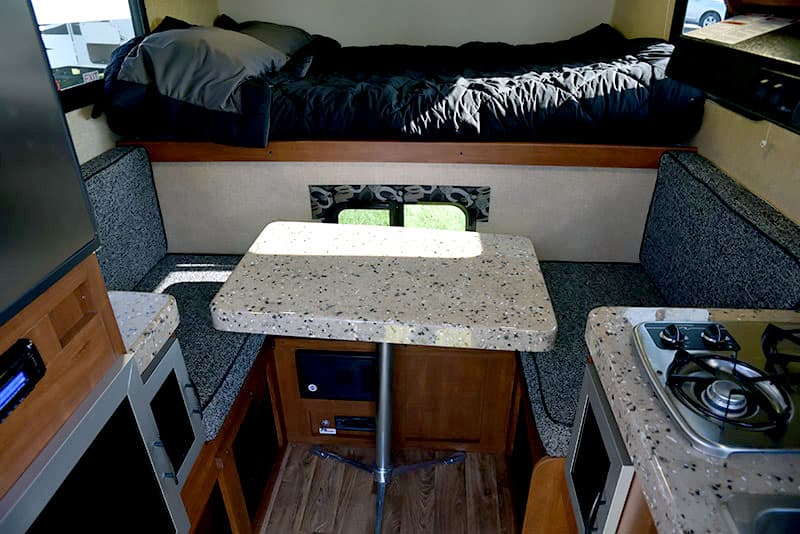 Face-to-face dinette with table in Travel Lite Air camper