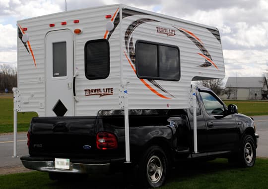 Travel Lite 625 with tailgate closed on a short bed truck