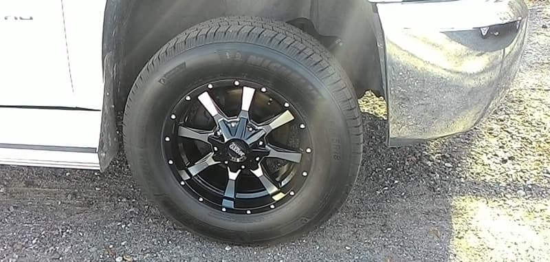 Upgraded Tires Chevy Truck With Bigfoot Camper