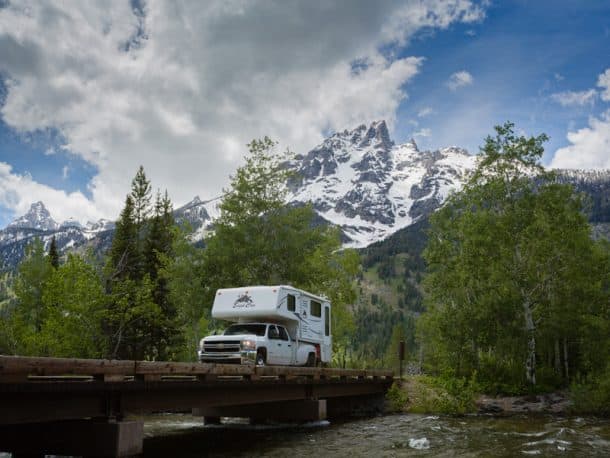 #521 - Mike and Lisa JohnsonGrand Teton National Park, Wyoming2008 Chevrolet 3500HD2008 Eagle Cap 1160Camera Used - Canon DSLR Leaving out of one of our favorite campgrounds around the Tetons, Gros Ventre, we headed out looking for bears in the Tetons.  We found Blondie (grizzly bear) and her new cubs and took a few photos.  Talking with a ranger we learned of more good places to look for wildlife.  This photo was taken near Jenny Lake after looking on the side of the Tetons for wildlife.  Impossible to see in this photo, but there was a mom and cubs on the side of the mountain.  While looking at the bears a group of college-age hikers came by.  We shared views through the scope, binoculars, and had a great time.