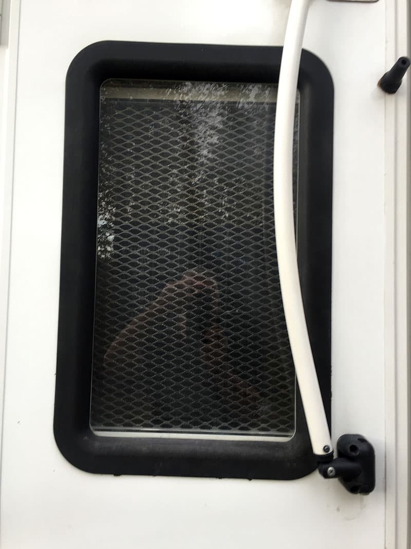 Camper Screen door solution for dogs