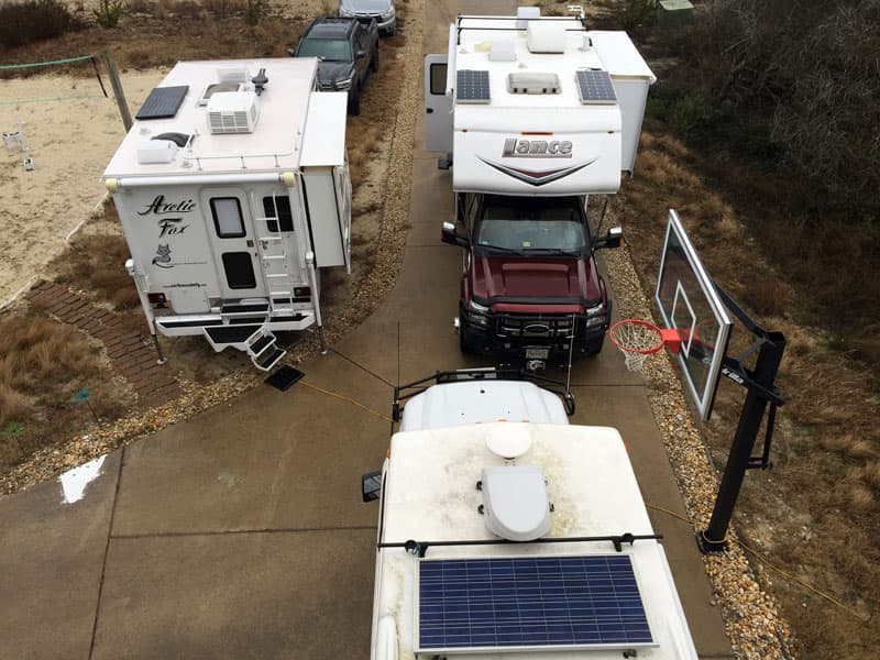 Truck campers in driveway