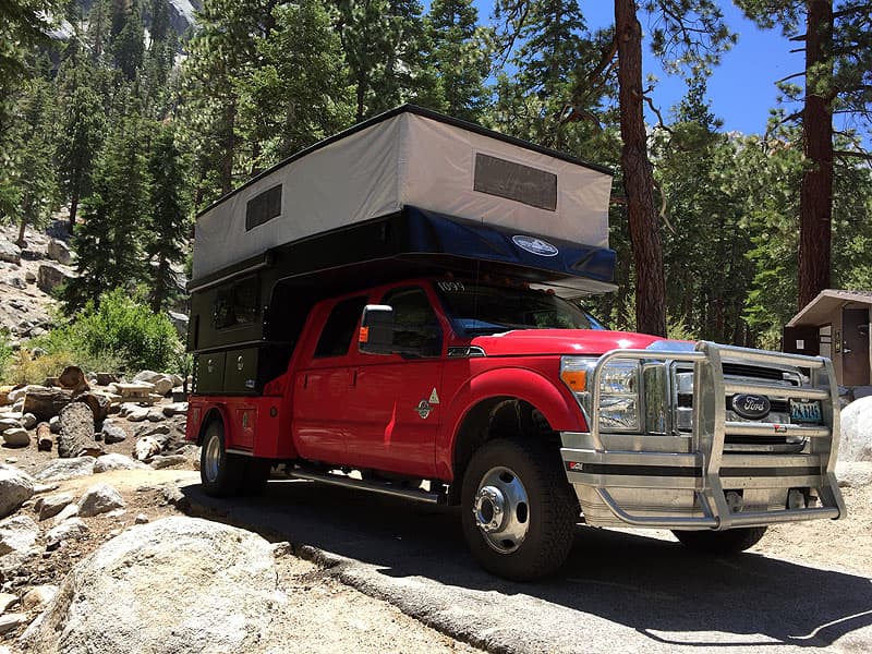 Campground with Phoenix Custom Pop-Up Camper