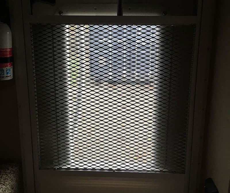 Diamond pattern screen door in camper