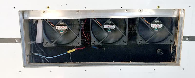 Fans installed in the top part of the compartment