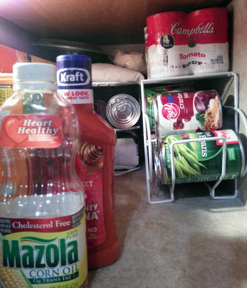 Cans on kitchen shelf