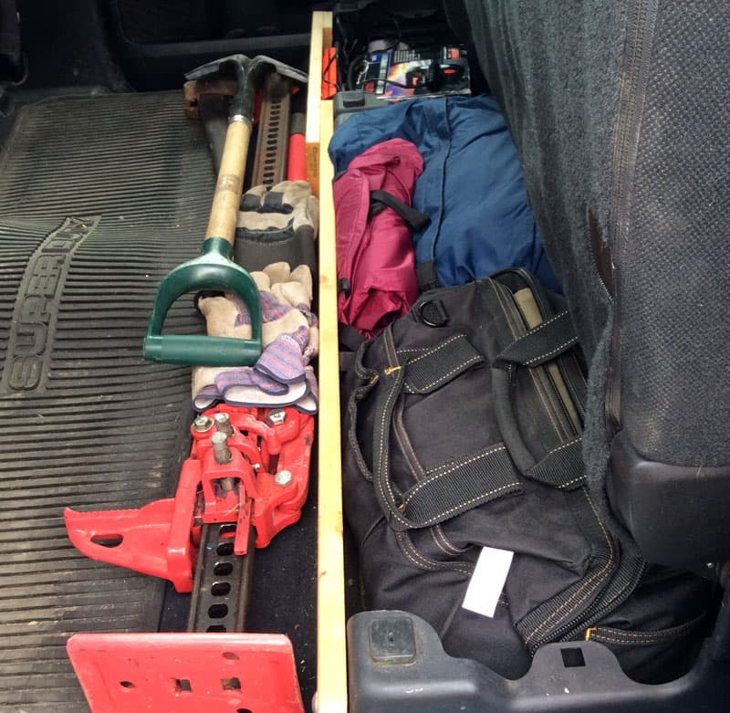 Off-road gear, shovels and jacks, in truck cab