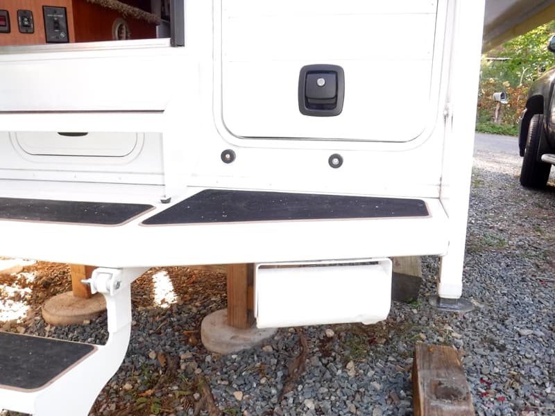 Paper towel holder on camper bumper