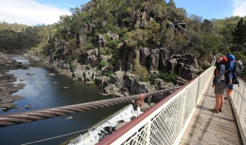 Hiking in Tasmania; Crossing the suspension bridge at Cataract Gorge, Launceston 