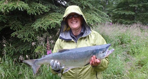 Linda fishing in Alaska