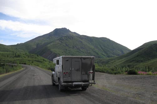 In the Yukon in a pop-up truck camper