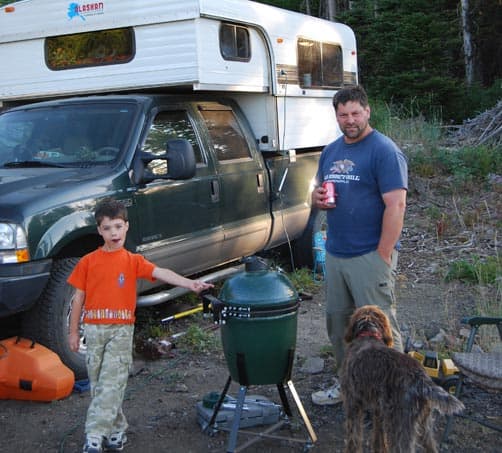 The Big Green Egg BBQ grill while out camping in the Alaskan camper