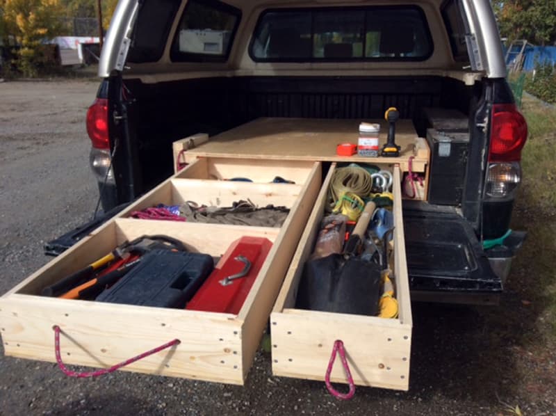 Truck canopy with storage