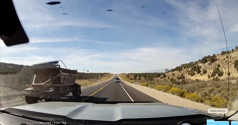 Truck Hit With Asphalt on a Dash Cam